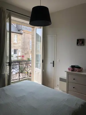 Un ou plusieurs lits dans un hébergement de l'établissement Fleur d’Iris