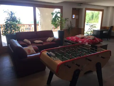 Coin salon dans l'établissement Lama-Gîte-des-Puys T3 Lamadalet, vue sud, terrasse, parking privé