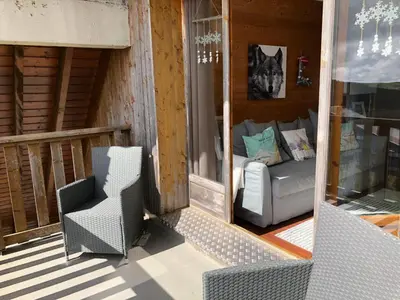 Coin salon dans l'établissement Lama-Gîte-des-Puys T3 Lamado vue époustouflante sud avec grande terrasse