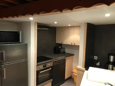 Cuisine ou kitchenette dans l'établissement LE SAPORTA- Studios et Appartements meublés de tourisme