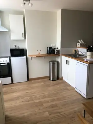 Cuisine ou kitchenette dans l'établissement Le Burin des Rosiers