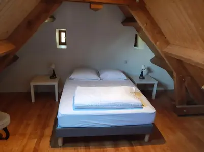 Un ou plusieurs lits dans un hébergement de l'établissement Gite avec charme entre Collonges la rouge-Turenne