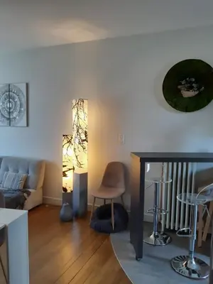 Coin salon dans l'établissement Maison de ville chaleureuse