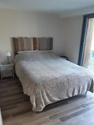 Un ou plusieurs lits dans un hébergement de l'établissement Maison de ville chaleureuse