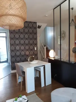 Coin salon dans l'établissement Maison de ville chaleureuse