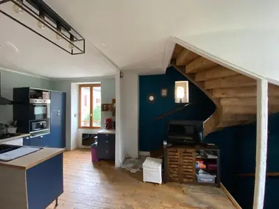 Cuisine ou kitchenette dans l'établissement La maison à la porte bleue