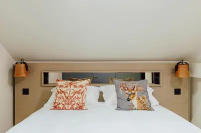 Un ou plusieurs lits dans un hébergement de l'établissement Hôtel Préfecture - Entrée autonome, réception en ligne - Encore Mieux
