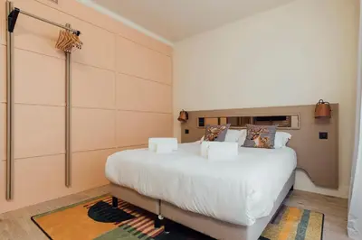 Un ou plusieurs lits dans un hébergement de l'établissement Hôtel Préfecture - Entrée autonome, réception en ligne - Encore Mieux
