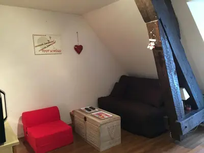 Coin salon dans l'établissement Studio face au Thermes