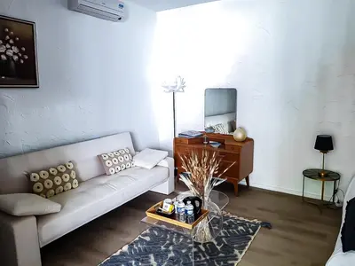 Coin salon dans l'établissement Les chambres du Roc