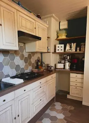Cuisine ou kitchenette dans l'établissement Le Passage du Faubourg, agréable T3 en duplex de 120m2