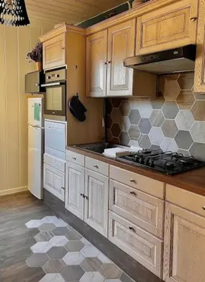 Cuisine ou kitchenette dans l'établissement Le Passage du Faubourg, agréable T3 en duplex de 120m2