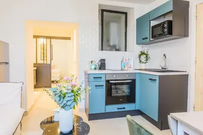 Cuisine ou kitchenette dans l'établissement Maison Victoire