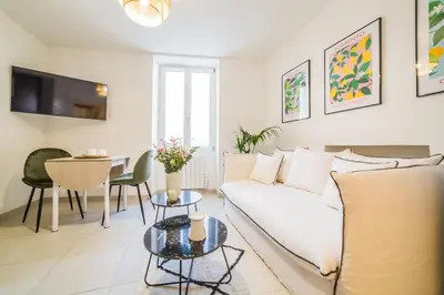 Télévision ou salle de divertissement dans l'établissement Maison Victoire