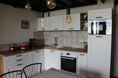 Cuisine ou kitchenette dans l'établissement Un petit coin de paradis à Super Besse