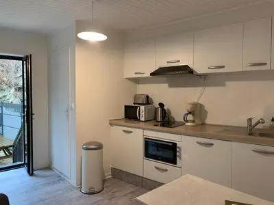 Cuisine ou kitchenette dans l'établissement Appartement 4 personnes, 1 chambre, terrasse, Wifi, proche du centre
