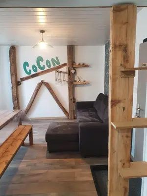 Coin salon dans l'établissement Bienvenue chez les ch'oups le cocoon