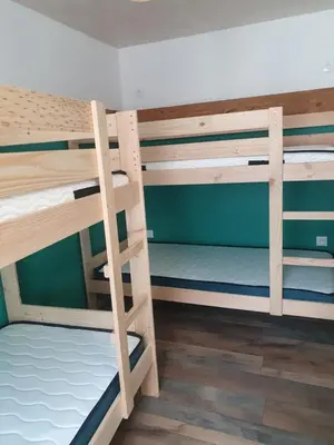 Un ou plusieurs lits dans un hébergement de l'établissement Bienvenue chez les ch'oups le cocoon