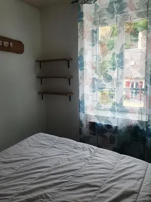 Un ou plusieurs lits dans un hébergement de l'établissement Bienvenue chez les ch'oups le cocoon