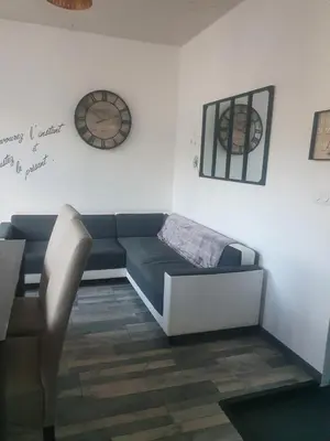 Coin salon dans l'établissement Bienvenue chez les ch'oups le loft 50 m2