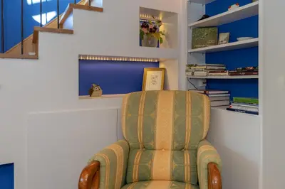 Coin salon dans l'établissement Gîte La Bergerie