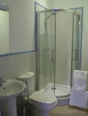 Salle de bains dans l'établissement La Maison Du Marchand