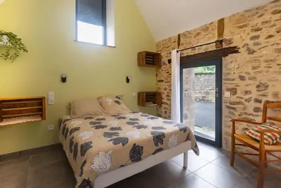 Un ou plusieurs lits dans un hébergement de l'établissement Le Pamparou, coquette maison au calme