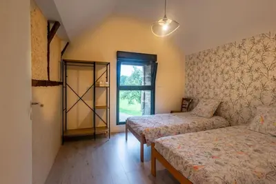 Un ou plusieurs lits dans un hébergement de l'établissement Le Pamparou, coquette maison au calme