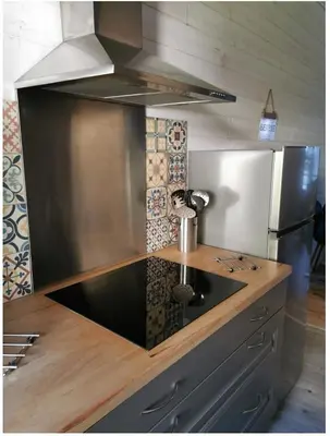 Cuisine ou kitchenette dans l'établissement Liladel