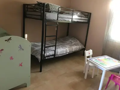 Un ou plusieurs lits dans un hébergement de l'établissement Vacances à Pomié