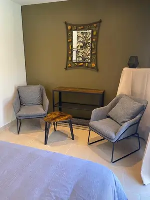 Coin salon dans l'établissement Vacances à Pomié