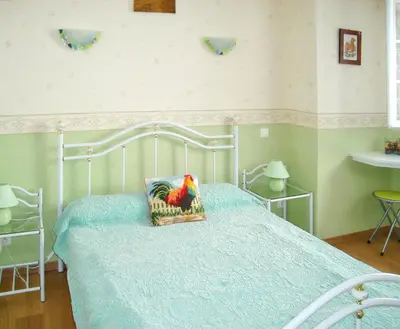 Un ou plusieurs lits dans un hébergement de l'établissement Maison de charme à Valuéjols avec vue sur les montagnes