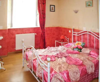 Un ou plusieurs lits dans un hébergement de l'établissement Maison de charme à Valuéjols avec vue sur les montagnes