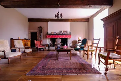 Coin salon dans l'établissement Le château du Fraysseix à Roziers-Saint-Georges
