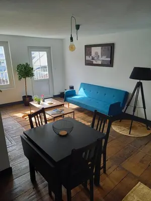 Coin salon dans l'établissement Appartement 3 pièces centre ancien de tulle