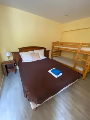 Un ou plusieurs lits dans un hébergement de l'établissement HOME LE SOFT Vic sur Cère