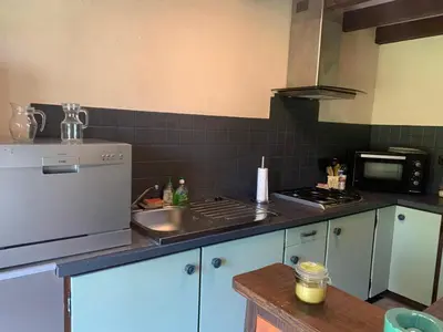 Cuisine ou kitchenette dans l'établissement Maison de campagne en Limousin