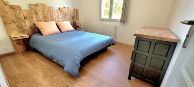 Un ou plusieurs lits dans un hébergement de l'établissement MAISON PLEIN-PIED DÉTENTE ASSUREE Clim-BBQ