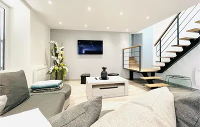 Coin salon dans l'établissement Gorgeous Home In Ussel With Wifi