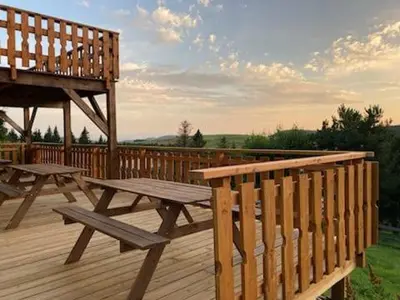 Balcon ou terrasse dans l'établissement Chalet- Capacité 8/10 pers au cœur de la station