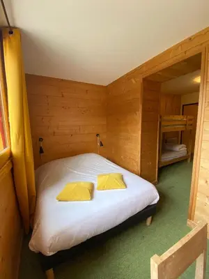 Un ou plusieurs lits dans un hébergement de l'établissement LE BUFADOU - Gîte Auberge -