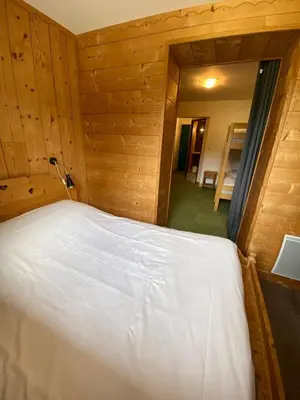 Un ou plusieurs lits dans un hébergement de l'établissement LE BUFADOU - Gîte Auberge -