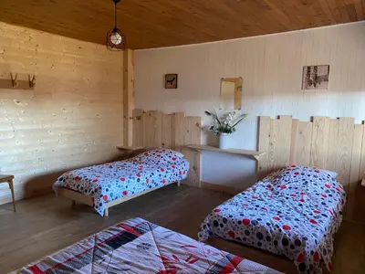 Un ou plusieurs lits dans un hébergement de l'établissement Les Genêts du Sancy