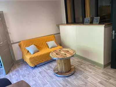 Coin salon dans l'établissement Appartement en Rez de jardin