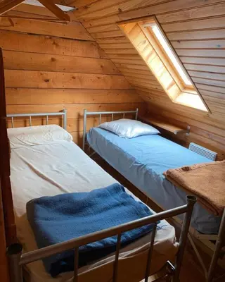 Un ou plusieurs lits dans un hébergement de l'établissement Maison Auvergne volcan Puy Mary Claux Giraldès GR400