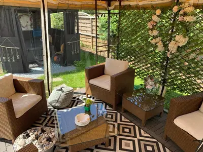 Coin salon dans l'établissement Maison Les Berrys