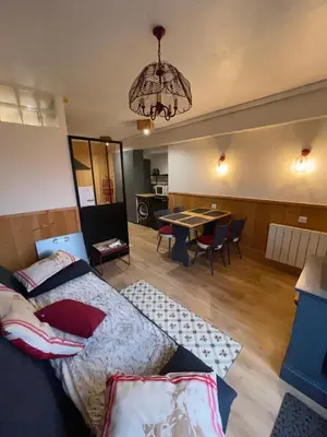 Coin salon dans l'établissement Appartements bien situés avec terrasse