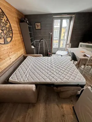 Un ou plusieurs lits dans un hébergement de l'établissement Le Martin pêcheur, Appartement proche hyper centre