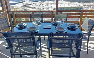 Balcon ou terrasse dans l'établissement La forêt des Marmottes