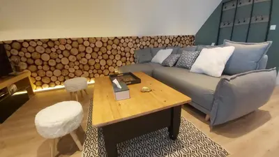Coin salon dans l'établissement La forêt des Marmottes